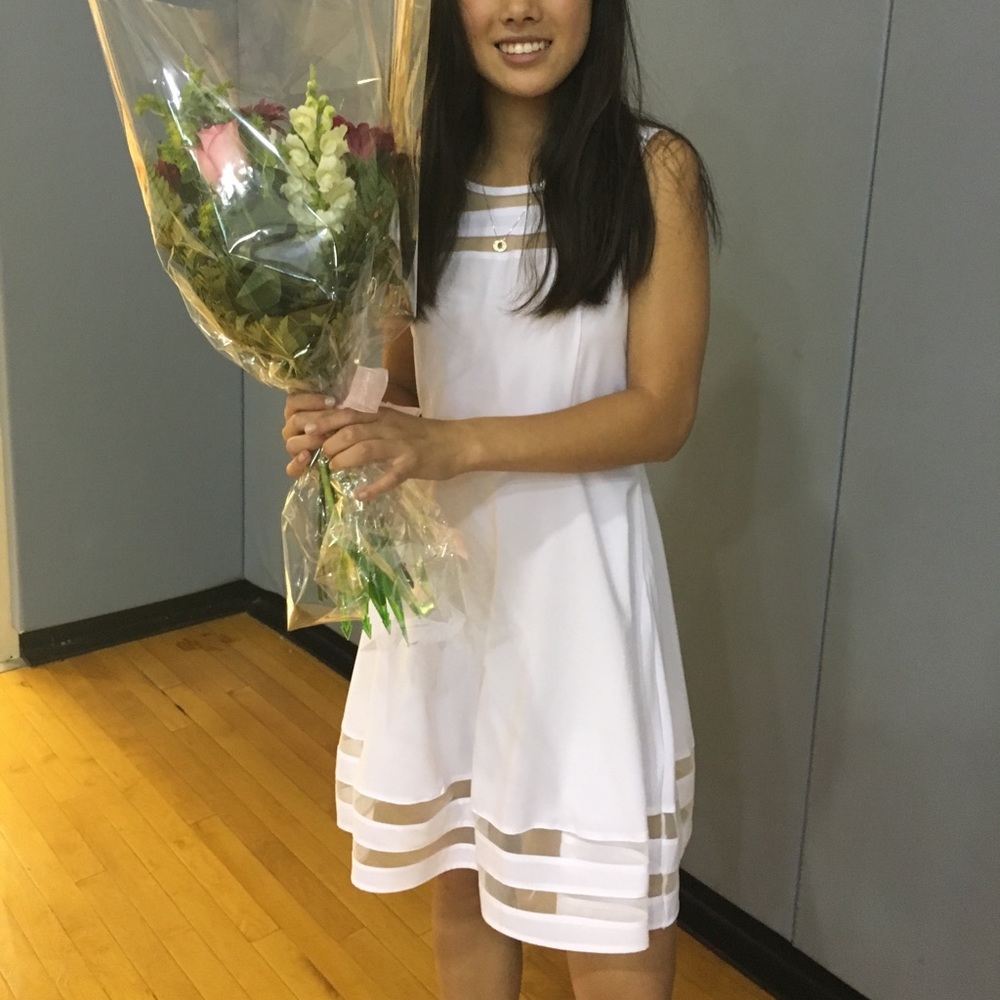 Woman’s short white dress